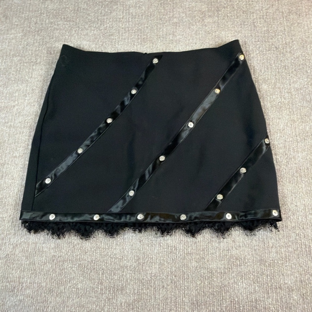ABS by Allen Schwartz black mini skirt with glamorous detailing 1329